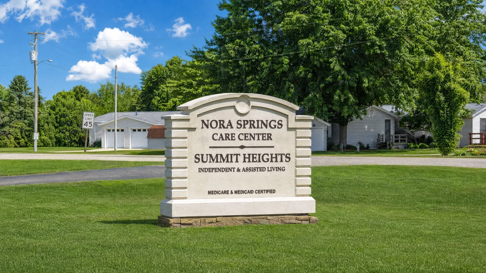 Monument sign for Nora Springs Care Center and Summit Heights Independent & Assisted Living